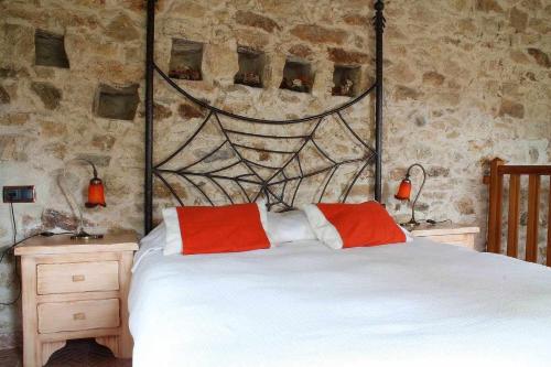 En eller flere senge i et værelse på La Quinta Del Chocolatero