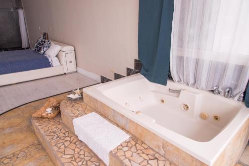 Ένα ή περισσότερα κρεβάτια σε δωμάτιο στο Oceanfront Serenity in Gated Community near Rosarito