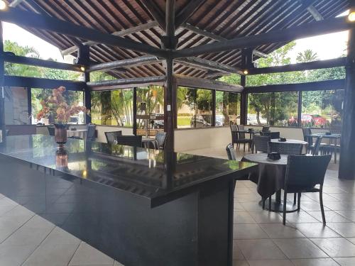 En restaurant eller et andet spisested på Nannai - Muro Alto - Alto Padrão