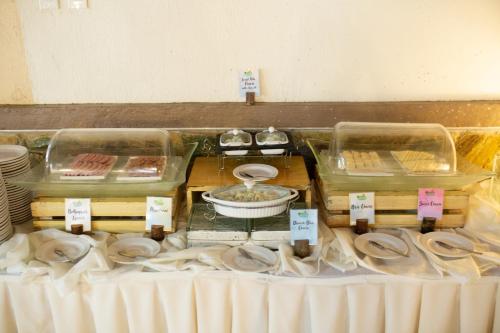 a table topped with plates and food on top at Bohol Beach Club in Panglao