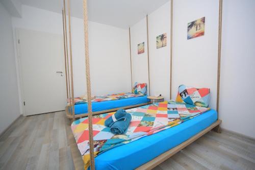 a bedroom with two bunk beds in it at Happy Family in Braşov