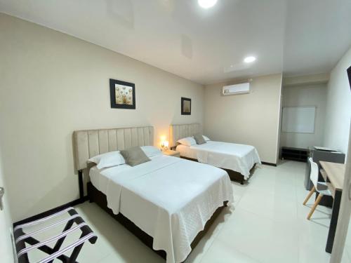Ένα ή περισσότερα κρεβάτια σε δωμάτιο στο Hotel Classic VIP