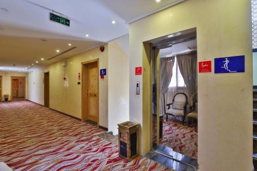 an empty hallway of a hospital with a room with a hallway at Dome Al Sulaimaniah in Riyadh