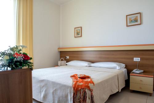 Hotel Le Tegnueにあるベッド