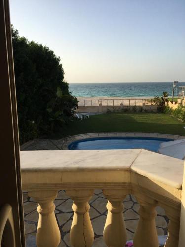 a view of the ocean from a balcony at North Coast Villa sea view with private pool in Alexandria