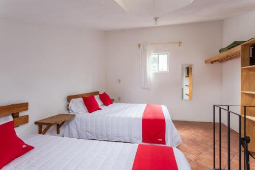 Postel nebo postele na pokoji v ubytování Hotel Paraje Casa Blanca
