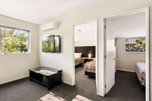 Quality Suites Amoreにあるベッド