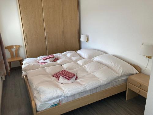 Postel nebo postele na pokoji v ubytování Chalet Bergli