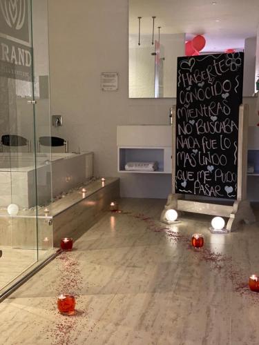 a room with a dance floor with red balls on the floor at HOTEL GRAND BOUTIQUE in Fusagasuga