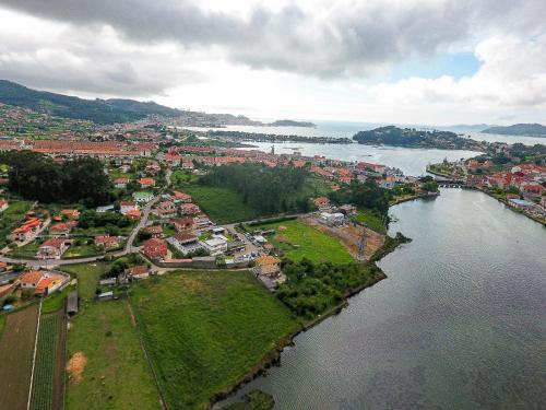 an aerial view of a town next to a body of water at Hotel Arce in Baiona