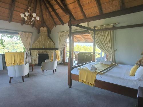 Katil atau katil-katil dalam bilik di Glen Afric Country Lodge