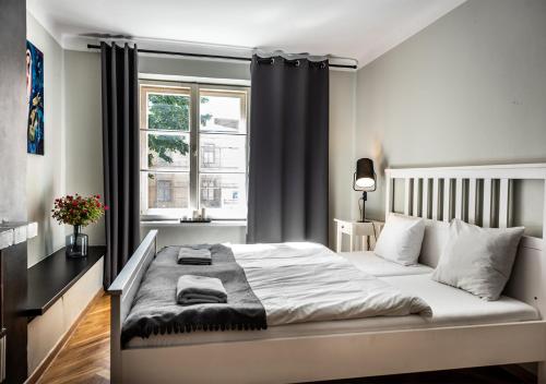 Posteľ alebo postele v izbe v ubytovaní Flamingo Premium Hostel