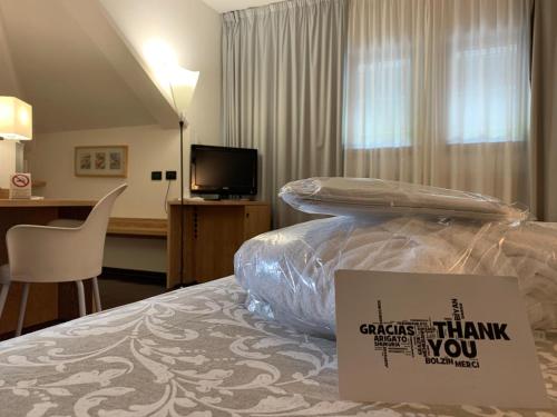 Ένα ή περισσότερα κρεβάτια σε δωμάτιο στο Hotel Logonovo