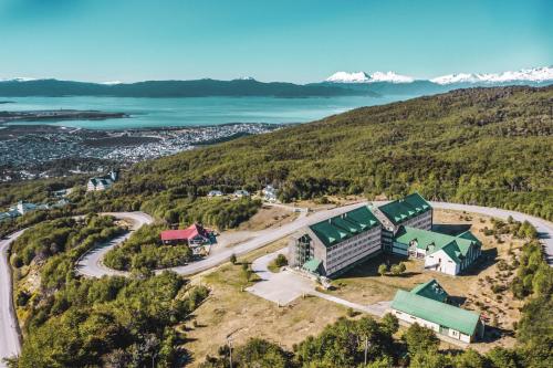 an aerial view of a building on top of a hill at Wyndham Garden Ushuaia Hotel del Glaciar in Ushuaia