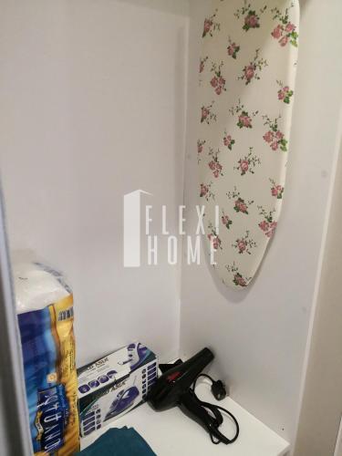 a shelf with a pair of scissors and a mirror at 9am-5pm, SAME DAY CHECK IN AND CHECK OUT, Work from Home, Comfy & Quiet Tamarind Suites-Cyberjaya by Flexihome-MY, in Cyberjaya