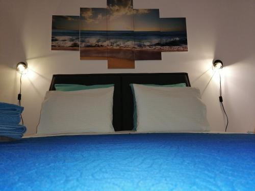 Ένα ή περισσότερα κρεβάτια σε δωμάτιο στο Azimute Guest House
