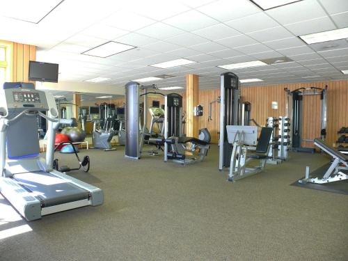 a gym with several treadmills and exercise machines at Christie Club in Steamboat Springs