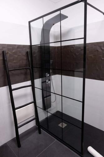 a glass display case in a room at Central Apartment in Pombal in Pombal