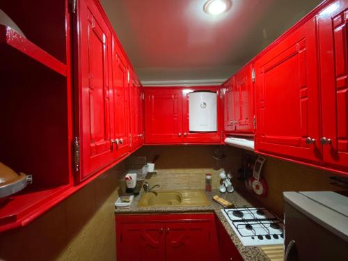 A kitchen or kitchenette at Très joli appartement au centre de IFRANE