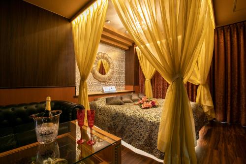 Giường trong phòng chung tại Hotel Park Inn (Adult Only)