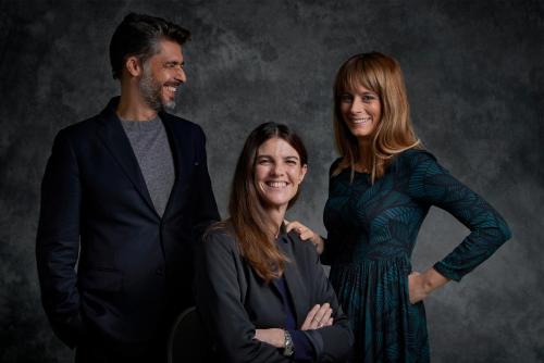 a man and two women standing next to each other at Hotel Flora in Venice