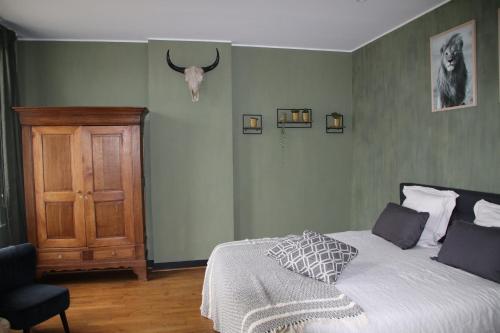 Postel nebo postele na pokoji v ubytování B&B Het Doctershoes
