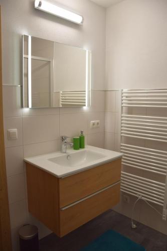 Kylpyhuone majoituspaikassa Alpen-Appartement Auerhof
