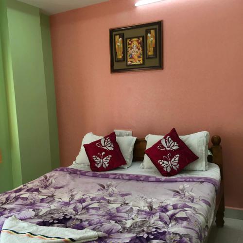 Jayaram Residency Srikalahastiにあるベッド