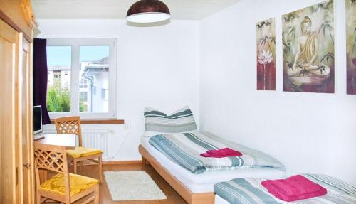 Un pat sau paturi într-o cameră la Churfirsten Blick - Private Gästezimmer