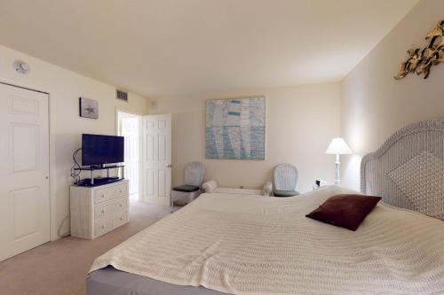 Ένα ή περισσότερα κρεβάτια σε δωμάτιο στο Sea Colony Chesapeake House II