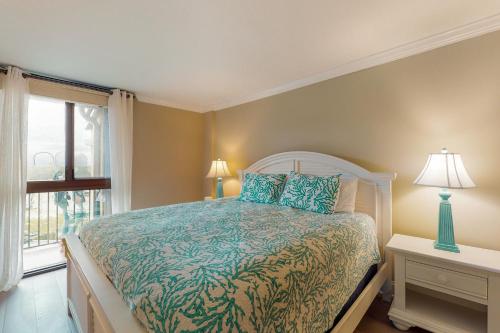 a bedroom with a bed and a window at Sea Colony Chesapeake House IV in Bethany Beach