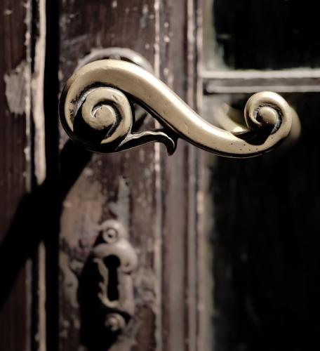a metal object on a building with a window at Hotel Torre Guelfa Palazzo Acciaiuoli in Florence