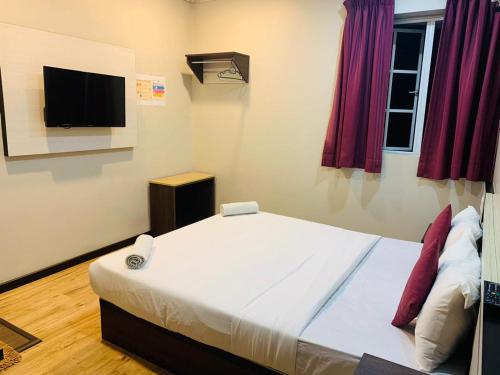Katil atau katil-katil dalam bilik di Zermatt Hotel