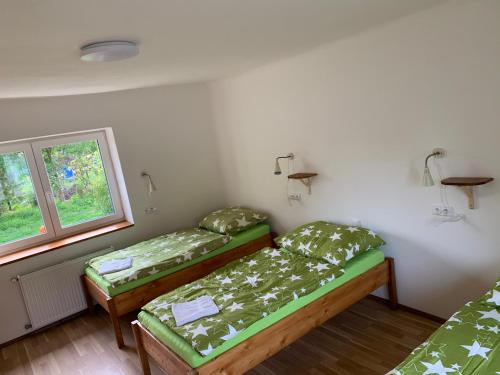 Apartmány Kosmonosy, Hradištská 193にあるベッド