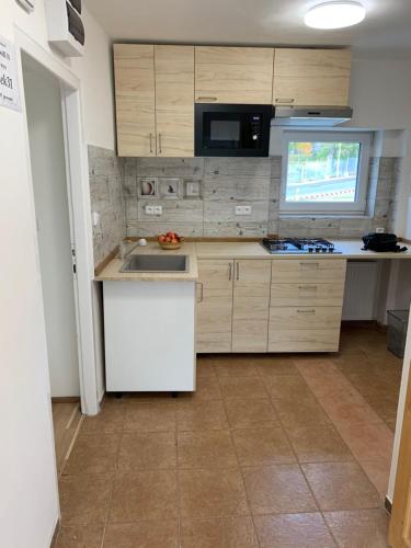 Apartmány Kosmonosy, Hradištská 193にあるキッチンまたは簡易キッチン