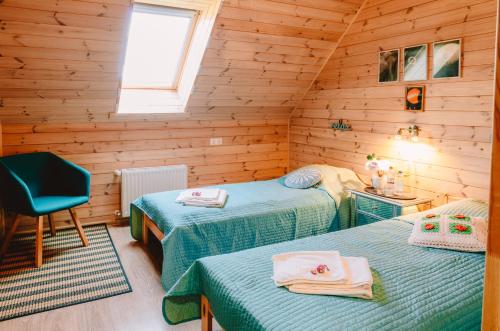 Una cama o camas en una habitación de Albireo