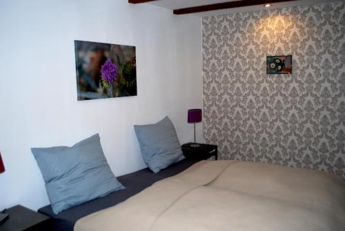 Katil atau katil-katil dalam bilik di Ferienwohnung Grafenland