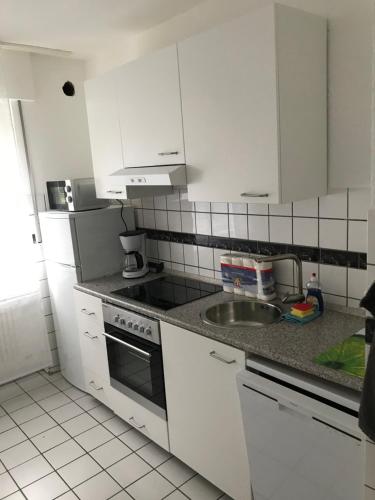 A cozinha ou cozinha compacta de Ferienwohnung An der Gildenstr 4