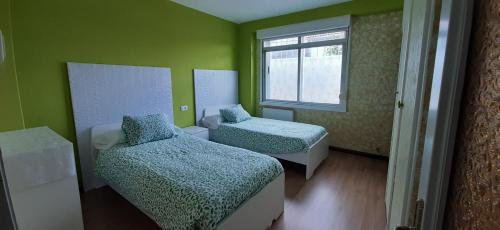 Katil atau katil-katil dalam bilik di O Arrequento