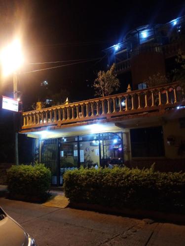 a building at night with lights on at POSAD FAMILIAR EL PARAiSO in Xilitla