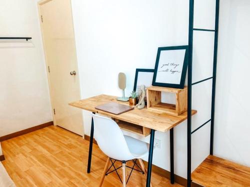 a room with a desk with a laptop and a chair at Kuantan Imperium by Glex in Kuantan