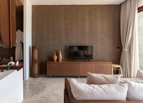 TV a/nebo společenská místnost v ubytování Chula Beach Resort