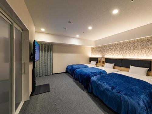 Katil atau katil-katil dalam bilik di Green Rich Hotel Kobe Sannomiya (Artificial hot spring Futamata Yunohana)