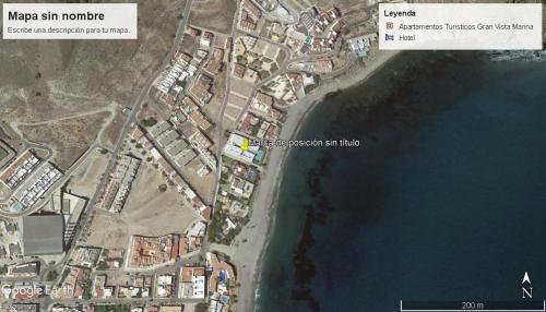 Un mapa de una ciudad junto a un cuerpo de agua en Apartamento Nautilus Beach, en Carboneras