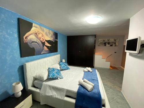Ein Bett oder Betten in einem Zimmer der Unterkunft Casa Raccuglia