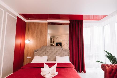 Ένα ή περισσότερα κρεβάτια σε δωμάτιο στο Royal Tower VIP Smart Apartments 4
