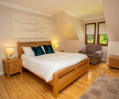 Katil atau katil-katil dalam bilik di Bonnie Banks Cottage