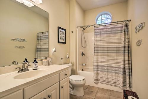 a bathroom with a sink and a toilet and a shower at Lakefront Paradise with Fire Pit - Dogs Welcome! in Chappells
