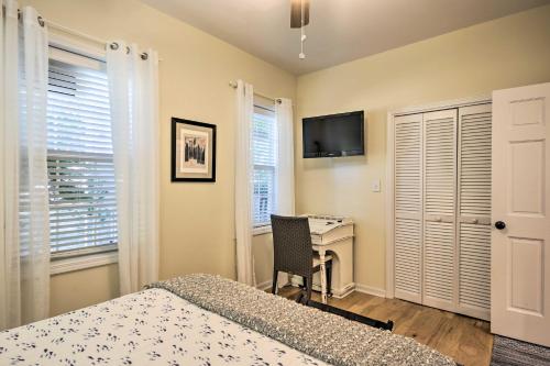a bedroom with a bed and a desk with a computer at Lakefront Paradise with Fire Pit - Dogs Welcome! in Chappells