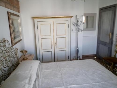 En eller flere senge i et værelse på ASFODELIA-CORALLO